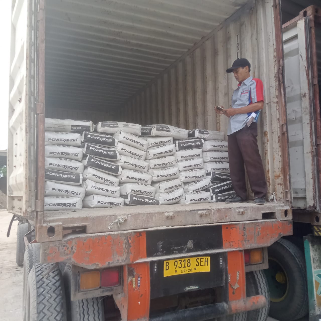 Pengiriman material Plasteran Powerbond PRO 879